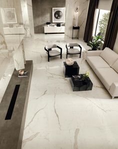 a living room with white marble floors and furniture