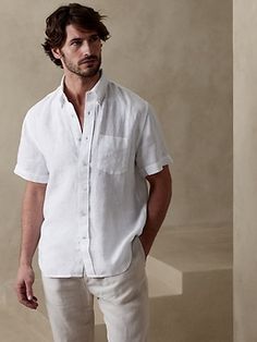 Luxurious, beautiful and naturally breathable, this linen shirt is crafted from 100% linen--a favorite for its ability to stay crisp and fresh even in heat and humidity.  UNTUCKED: Specially cut 1" shorter through the body for an untucked fit that st Cake With Flowers Simple, Dress Code Theme, Dessert For Guests, Costa Rica Fashion, White Party Attire, Neutral Family Photos, Brunch Reception, Mens Banana Republic, Boys Khaki Pants