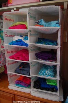 the closet is filled with clothes and other items for children's playrooms