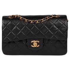 Chanel Black Quilted Lambskin Vintage Small Classic Double Flap Bag Product Details Xupes Ref: HB5639 Brand: Chanel Model: Small Classic Double Flap Bag Type: Shoulder Serial Number: 3744899 Age: 1996 RRP: £8,510 Accompanied By: Chanel Dust Bag, Authenticity Card Colour: Black Hardware: Gold (24k Plated) Material(s): Lambskin Leather Specification Height: 15cm Width: 23cm Depth: 7cm Strap Drop: Single: 38cm Double: 22cm Interior: Black Leather Closure: Turn Lock Country of Origin: France Authent Chanel Model, Black Quilt, Chanel Black, Black Hardware, Vintage Chanel, Flap Bag, Lambskin Leather, Fashion Handbags, Purse Wallet