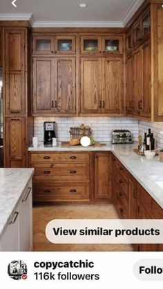 a kitchen with wooden cabinets and marble counter tops in the center is an advertisement for international bamboo doors