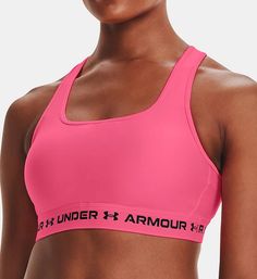 Crossed back sports bra features Under Armour's super soft HeatGear fabric that is bound to feel like a second skin. Wireless cups come with light removable padding for better support. Removable padding also has unique perforated foam for added breathability. Wire-free cups have microfiber lining with perforations for breathable comfort. Cups have pockets for light, removable padding with left and right labels. Scoop neckline has an elastic-bound edge to keep fit close. Center has inner mesh ins Medium Support Sports Bra, Cerise Pink, Keep Fit, Under Armour Women, Weight Training, Second Skin, Left And Right, Scoop Neckline, Pullover Styling