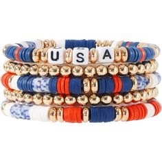 four bracelets with the word usa written on them in gold, white and blue