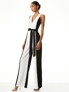 Talk about a one-piece to amp up your look. With a v-neck, flared leg and long inseam, it's just so chic. alice + olivia Tessa V-Neck Wide Leg Jumpsuit Women Tuxedo, Jumpsuit Wedding, Tuxedo Jumpsuit, Black White Jumpsuit, Olivia Black, Alice And Olivia, White Jumpsuit, Leather Dresses, Fashion Black