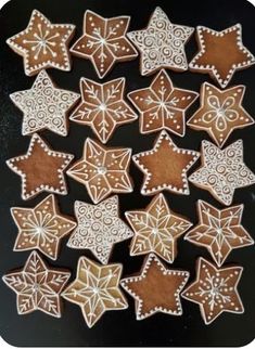 some cookies that are shaped like snowflakes