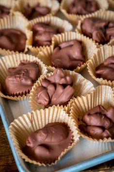 there are many chocolates in the tray on the table and ready to be eaten