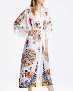 The mulberry silk kimono print robe is, soft color, soft and comfortable, and silky skin-friendly, the combination of pure mulberry silk material and exquisite digital inkjet printing is more elegant and luxurious. Sexy V-neck, showing the soft line of the neck and modifying the face. The loose three-quarter sleeves are comfortable and easy for the wrist to move freely. The waist tie design breaks mediocrity, improves the waistline, and shows the perfect proportion. Inner ties design, Inner ties Silk V-neck Kimono For Daywear, Silk V-neck Robe For Loungewear, Wrap Robe For Relaxation In Spring, Spring Wrap Robe For Relaxation, Silk V-neck Summer Robe, Spring Wrap Loungewear Robe, Chic Long Robe For Loungewear, Chic Long Loungewear Robe, Elegant Summer Relaxation Kimono