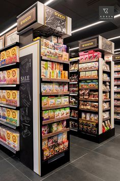 an aisle in a grocery store filled with lots of food