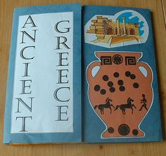 an ancient greek book with pictures of vases on the front and back cover, sitting on a wooden table