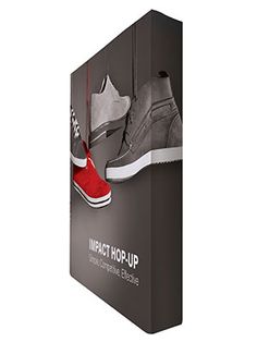 a pair of shoes hanging from the side of a shoe box with an ad for impact top - up