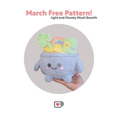 a hand holding a small stuffed animal with a hat on it's head and the text march free pattern light and chunky wool benefit