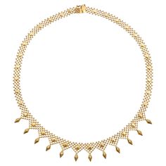 A timeless vintage woven choker chain necklace created in 14 karat gold. The chain of the necklace is beautifully made and represents twelve diamond-shaped figures and small balls on the side of the chain. The links are all nicely put together, which gives this a beautiful woven wickerwork look. On top of the woven links many round-shaped motifs are placed. The duty box clasp ensures that the necklace will stay securely around the neck and is provided with an extra eight clap closure. The neckla Woven Choker, Black And Gold Jewelry, Gold Jewelry Box, Choker Chain Necklace, The Bling Ring, Choker Chain, Bling Ring, Vintage Choker, Woven Chain