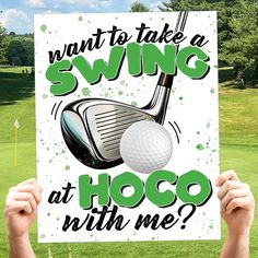 a person holding up a sign with a golf ball and club on it that says, i want to take a swing at hoo with me?