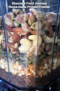 a blender filled with nuts and other food