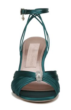 Bridal designer Pnina Tornai adds signature crystal and heart embellishments to this forever-elegant sandal set atop a slim heel. 3 1/4" heel Adjustable ankle strap with buckle closure; hidden elastic inset Textile upper and lining/leather sole Imported Heart Embellishments, Pnina Tornai, Elegant Sandals, Bridal Designs, Designer Heels, Green Fabric, Ankle Strap, Womens Sandals, Embellishments