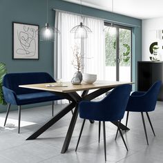 a dining room with blue chairs and a wooden table