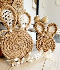 some twine and rope decorations are sitting on a table