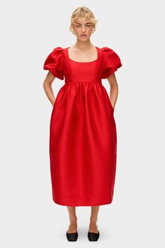 Puff sleeve satin party dress Fit and flare silhouette Midi length Structured jacquard satin to hold shape Tailored fit Invisible zip Shaped rounded square neckline Side seam pockets Size 10 has a front length of 126cm ( measured from side neck point to hem)