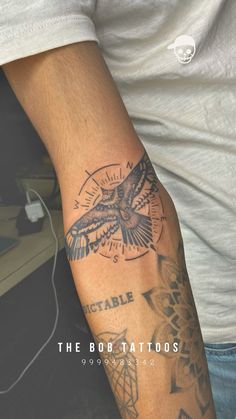 a man's arm with a tattoo on it and the words, the bob tattoos