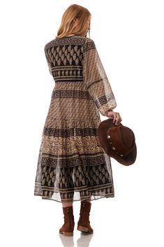 The color combination in the Kayla dress is mesmerizing. Pair it with boots or high heels for your glamorous evening. Perfect for a date night or brunch with your girlfriends, the perfect dress for any boho gal.Printed Midi Dress With Long SleevesColor: Vintage Brown Sizes: Small/Medium, Fits Size 2 to 6 and Medium/Large, Fits Size 6 to 10 100% Indian Cotton With a Lining Made in India Midi Dress Vintage, Long Sleeve Boho Dress, Y2k Dresses, Puff Long Sleeves, Printed Long Dresses, Boho Fall, Women Cargos, Indian Cotton, Edgy Look