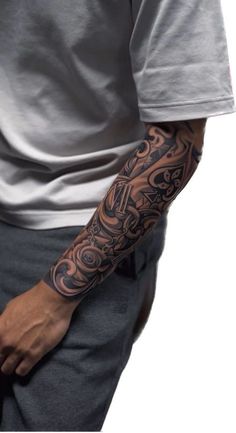 a man with a tattoo on his arm