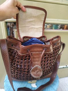 "Welcome! Vintage women bag Leather and fabric In good vintage condition! Brand: Robert Pietri Measures: TAll: 9.05\" (23 cm) W: 9.84\" (25 cm) Deep: 3.54\" (9 cm) Adjustable Strap: 44.88\" (114 cm) Thanks for stopping by!IMPORTANT: Due to the delicate situation We're all going through, and in order to keep the safety of courier workers too, all orders will be dispatched when alert sanitary finished. You can purchased or reserve items like always. Thanks so much for your understanding." Vintage Brown Tote Bucket Bag, Vintage Tote Bucket Bag For Travel, Vintage Travel Tote Bucket Bag, Vintage Travel Bucket Tote Bag, Vintage Bucket Bag With Leather Handles For Everyday Use, Retro Bags With Leather Trim For Daily Use, Retro Bags With Leather Trim, Vintage Brown Bucket Bag, Vintage Leather Bucket Bag With Removable Pouch