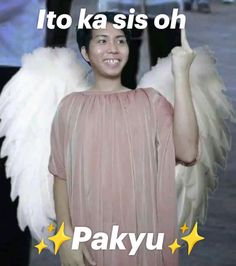 a woman in pink dress with white angel wings on her shoulder and the words, to ka sis oh