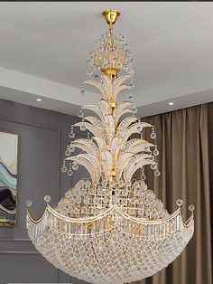 a chandelier hanging from the ceiling in a room