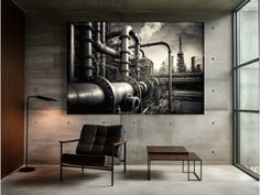 a black and white photo of pipes on a wall next to a chair in a room