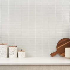 the kitchen counter is clean and ready to be used as a place for cooking utensils