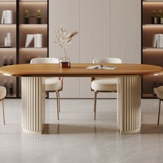 a dining room table with chairs around it and bookshelves in the back ground