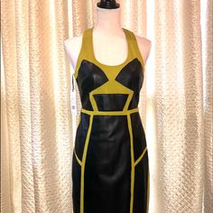 New With Tags! Excellent Condition; Never Worn! Unique Design: Geometric Leather On Lime Green Fabric. Bought @ Chatta Box-Baton Rouge One Picture Looks Like The Leather Doesn’t Line Up, But It Does. The Way It Was Hanging On The Mannequin Made It Look Off. Form Fitting Scoop Neckline Racerback Knee Length Or Just Below Lined Dress: 68% Nylon, 32% Spandex, 100% Lamb Leather Lining: 79% Nylon, 21% Lycra Spandex Size 6 Dress, Nicole Miller, Leather Dress, Green Fabric, Scoop Neckline, Lime Green, One Pic, Knee Length, Colorful Dresses