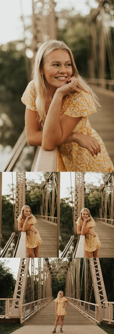 a woman standing on top of a bridge next to a tall metal structure and smiling