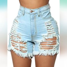 Women High Rise Distressed Stretchy Jean Shorts Ripped Hole Denim Short Jeans Color: Light Blue Size; L (8/10) Waist: 31.5" Hip:34.5" Fitted Denim Shorts With Ripped Details, Ripped Blue Short Jeans, Blue Ripped Short Length Jeans, Ripped High Waist Denim Blue Shorts, High Waist Ripped Denim Blue Shorts, Blue Ripped High Waist Shorts, Light Wash Ripped Denim Bottoms, Ripped High Waist Medium Wash Bottoms, Ripped High Rise Light Wash Bottoms