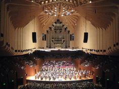 an overhead view of a concert hall filled with people