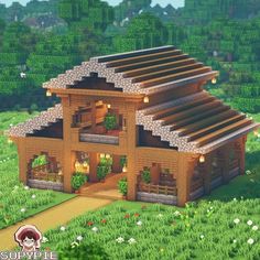 a small wooden house in the middle of a field