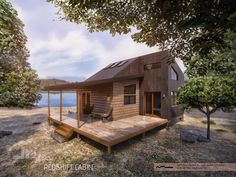 a small wooden cabin sitting on top of a grass covered field