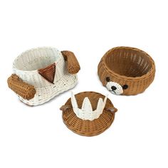 three wicker baskets with teddy bears in them, one is brown and the other is white