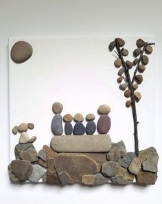 there is a rock and stone artwork on the wall