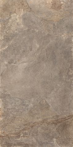 an image of a tile floor with grey and brown colors