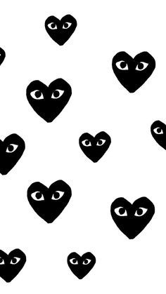 black and white hearts with eyes drawn on them