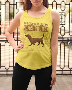 a woman wearing a yellow tank top that says 10 reasons to love my dachshund