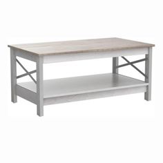 a white coffee table with two shelves underneath it