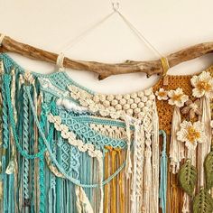 there is a wall hanging made out of macrame