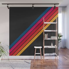 an abstract wall mural with multicolored stripes