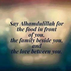 a blurry photo with the words say alhamdullah for the food in front of you, the family beside you, and the love between you