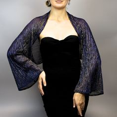 A very elegant and classical capelet for your wedding dress, evening dress or party outfit made of the finest stretch fabric, very soft.  Color : navy blue metallic  Size : unique ( fits all ) , but if you have any doubts, please contact me We accept credit cards! Chic Stretch Shrug For Party, Chic Fitted Shrug For Evening, Chic Fitted Evening Shrug, Chic Capelet With Cape Sleeves For Party, Fitted Cape With Cape Sleeves For Evening, Chic Capelet For Party, Elegant Party Cape With Cape Sleeves, Elegant Fitted Shawl For Evening, Elegant Evening Capelet