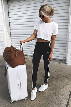 cropped white tshirt + black and white striped adidas joggers + white running shoes l sporty casual outfits for everyday wear #sportychic #adidas #activewear #leggings Summer Airplane Outfit, Adidas Pants Outfit, Looks Adidas, Cute Travel Outfits, Comfy Travel Outfit, Airplane Outfits, Fashion Travel Outfit, Look Adidas, Athleisure Trend