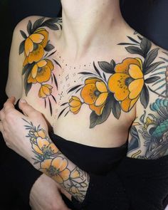 a woman with yellow flowers on her chest