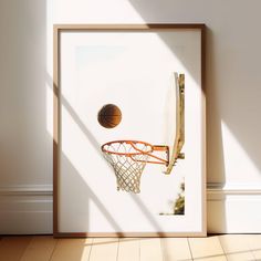 an image of a basketball going through the hoop with sunlight coming in from behind it